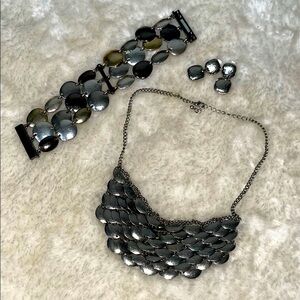 Silver intricate Necklace, Bracelet, and a pair of Earrings